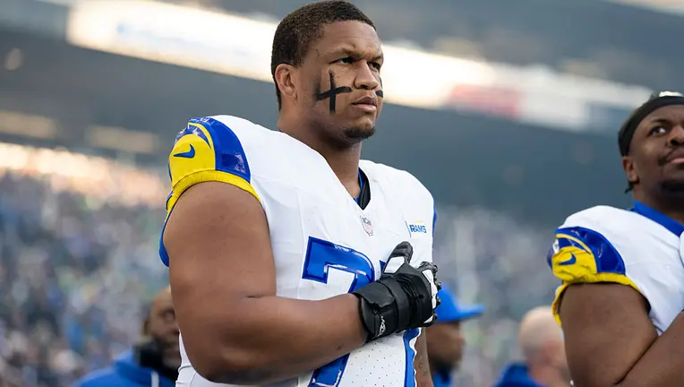Los Angeles Rams starting left tackle Alaric Jackson in uniform during offseason workouts