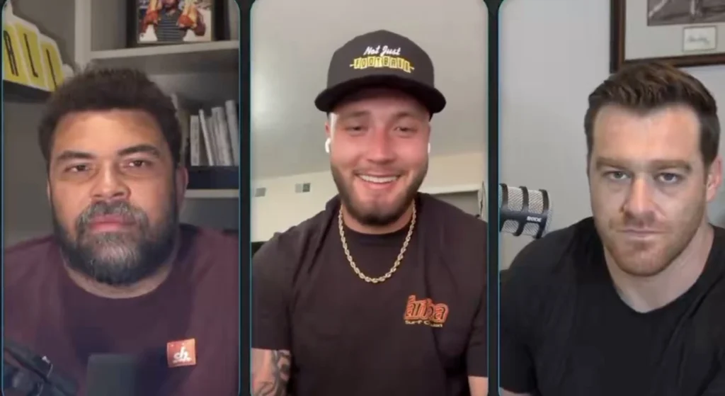 Pittsburgh Steelers outside linebackers Nick Herbig, T.J. Watt, and Alex Highsmith in a defensive huddle during 2026 offseason workouts, capturing team unity and chemistry