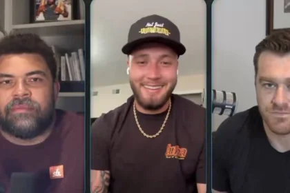 Pittsburgh Steelers outside linebackers Nick Herbig, T.J. Watt, and Alex Highsmith in a defensive huddle during 2026 offseason workouts, capturing team unity and chemistry